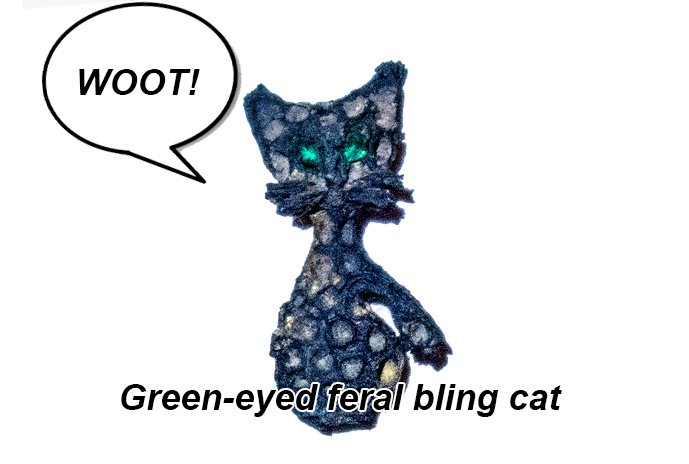 green-eyed feral bling cat
